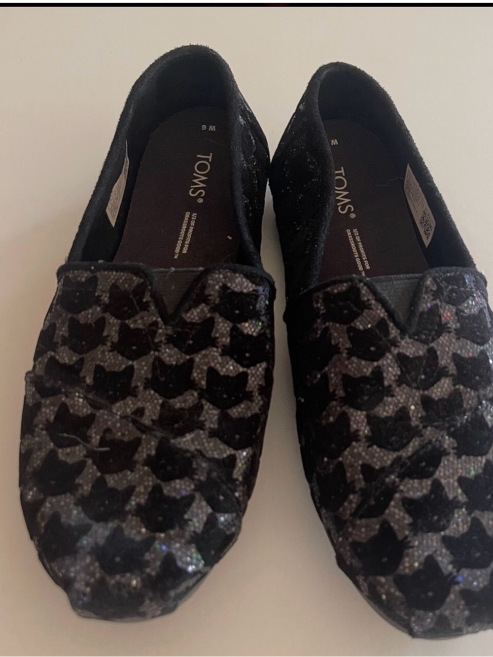 TOMS Black Glitter Cat-Print Slip-On Flats
